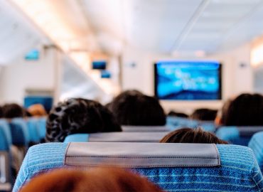 On board an aeroplane. Flight. In-flight.