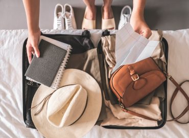 Travel. Staycation.local travel new normal.Girl traveler packing luggage in suitcase Travel,tourism,